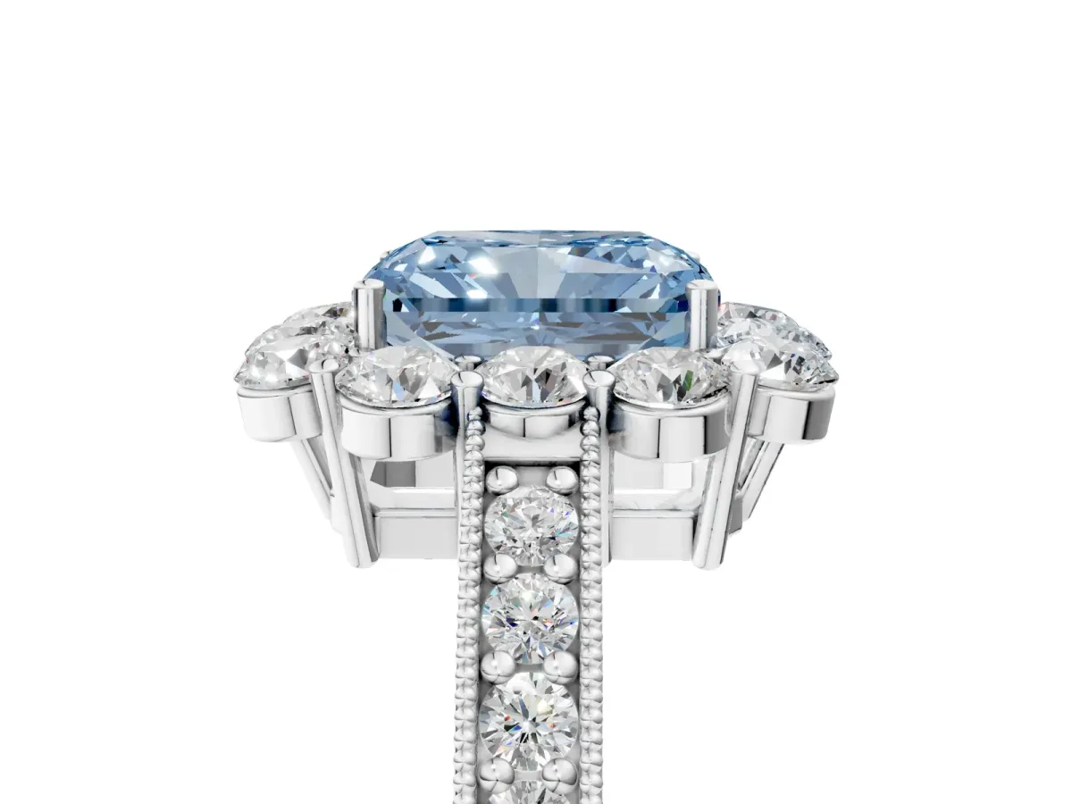 Fancy Blue Radiant Cut Cut Halo Diamond Pavé Engagement Ring with Milgrain Detailing Platinum