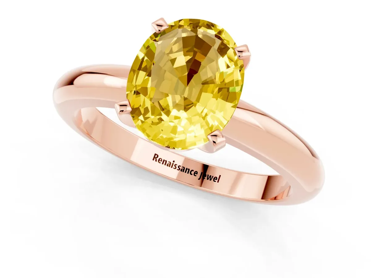 Oval Cut Yellow Sapphire Solitaire Engagement Ring with Round Band and Four-Prong Setting Rose gold