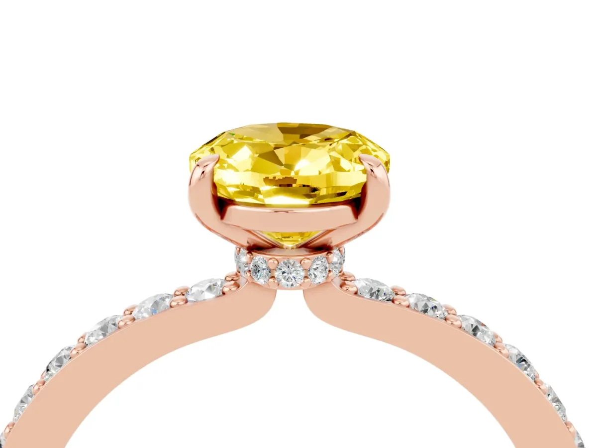 Oval Cut Yellow Sapphire Solitaire Engagement Ring with Pavé Band and Four-Prong Setting Rose gold