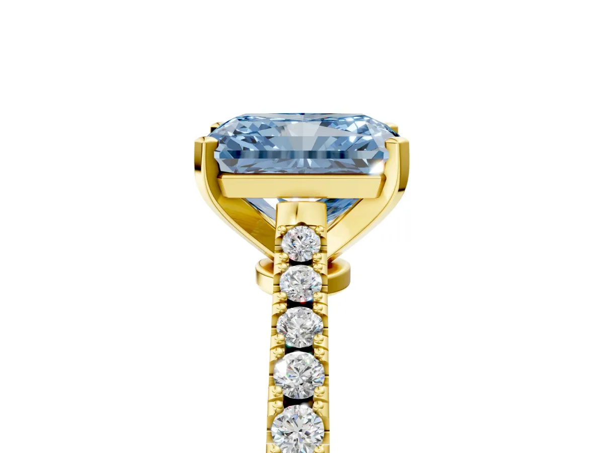 Fancy Blue Radiant Cut Cut Solitaire Diamond Engagement Ring with Pave Band and Four-Prong Setting Yellow gold