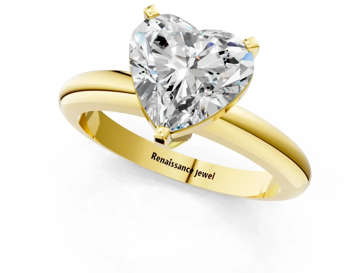 Heart Cut Diamond Solitaire Engagement Ring with Round Band and Four-Prong Setting Yellow gold