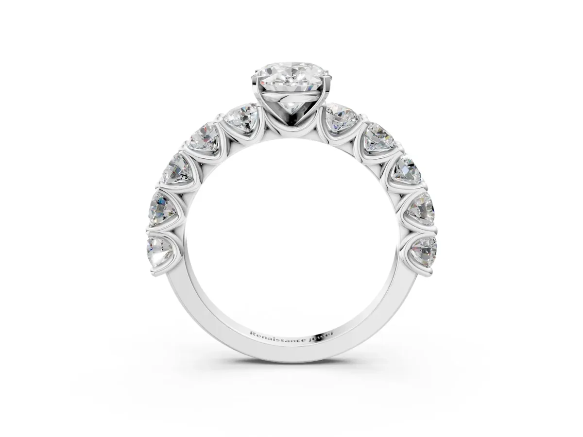Oval Cut Diamond Prong Setting with Side Stones on a Pave Band Silver