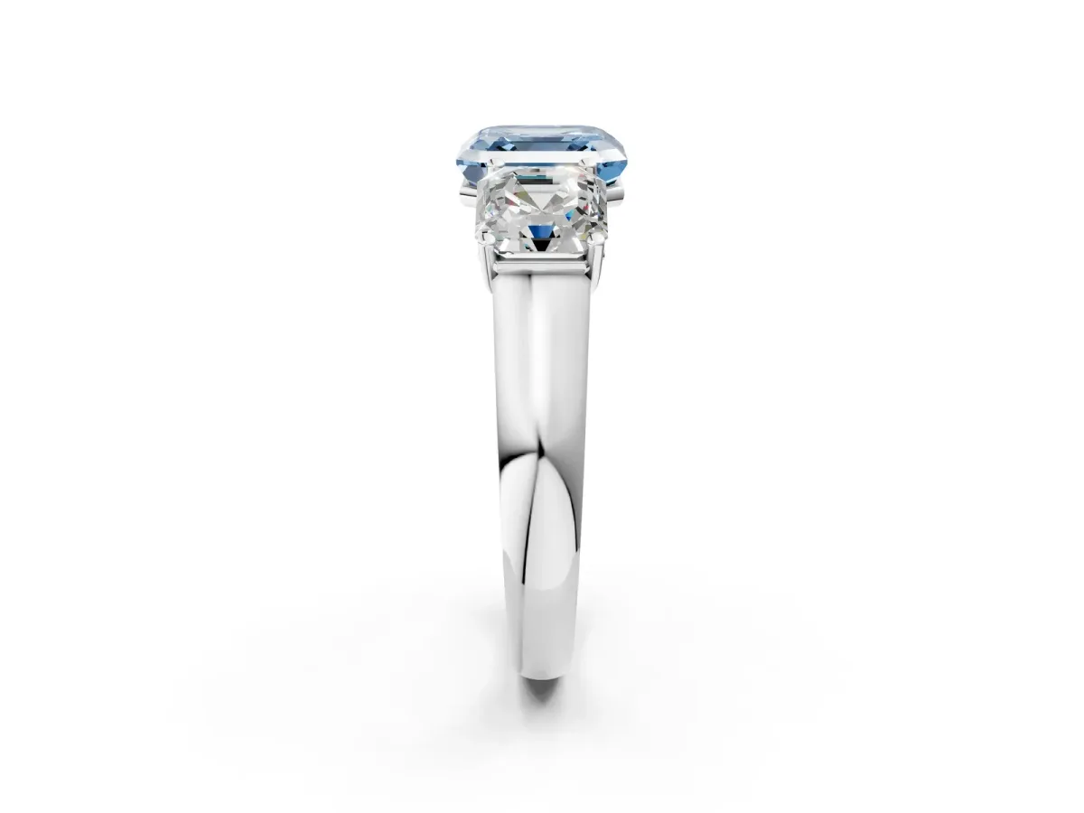 Fancy Blue Asscher Cut Three-Stone Diamond Ring with Prong Setting on a Classic Band Platinum