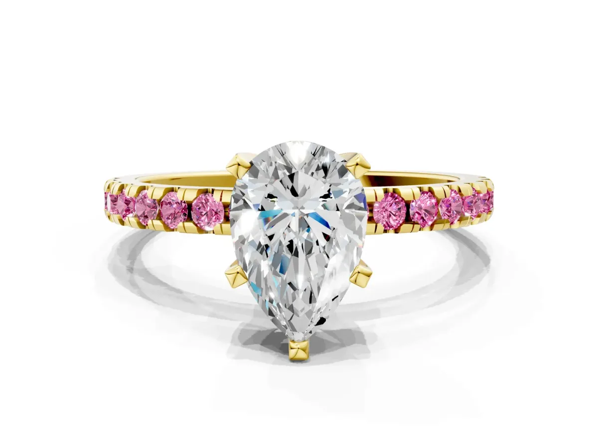 Pear Cut Diamond Solitaire Ring with Round Pink Sapphire Pavé Band and Four-Prong Setting Yellow gold