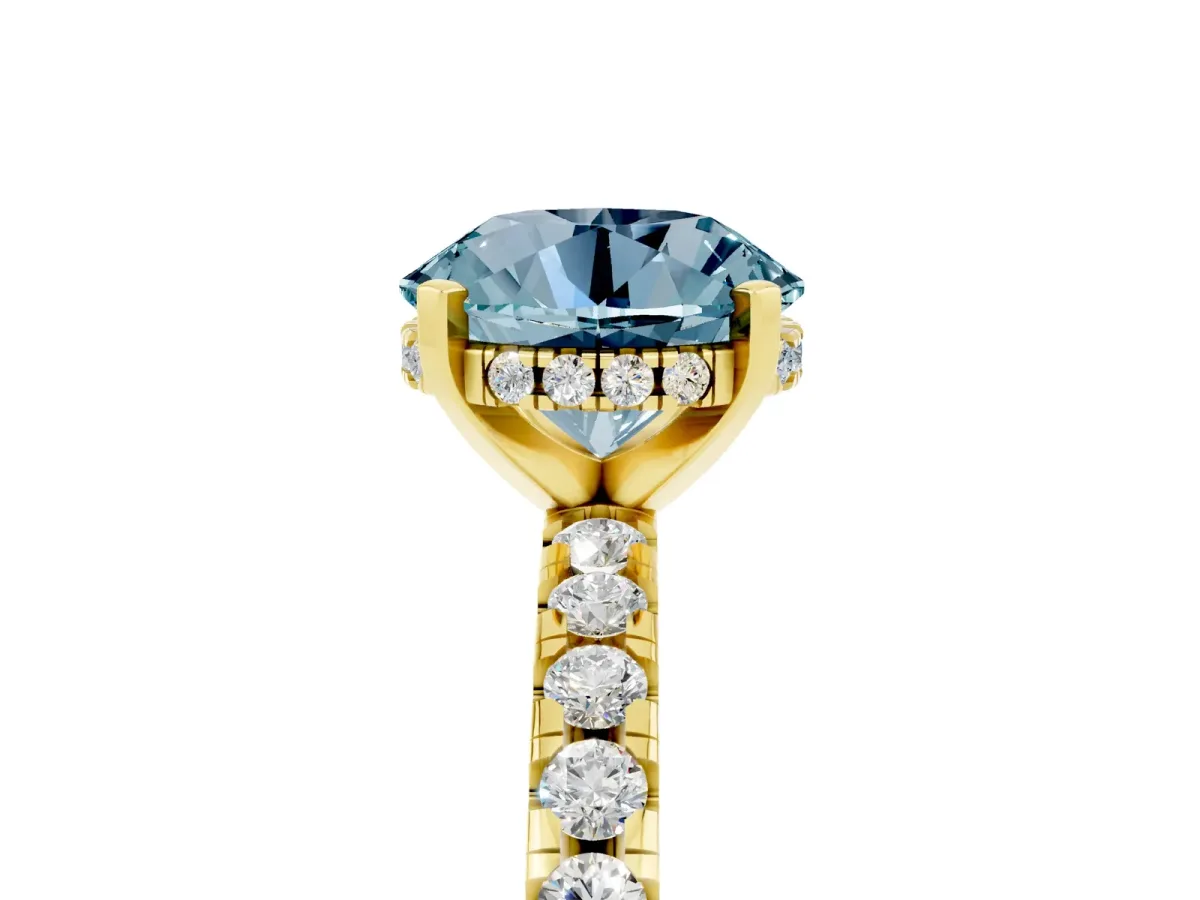 Round Cut Aquamarine Solitaire Ring with Round Pavé Band and Four-Prong Setting Yellow gold