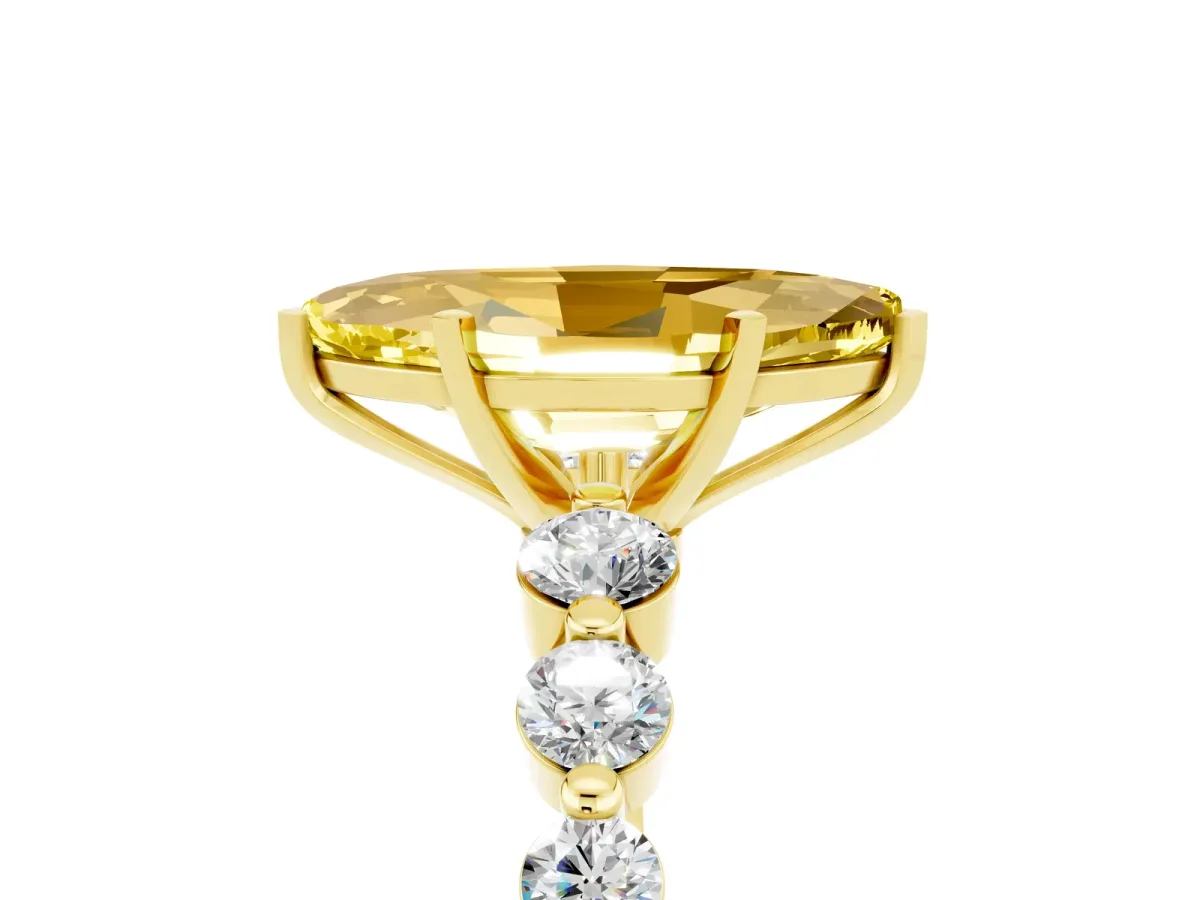 Marquise Cut Solitaire Yellow Sapphire Ring with Pave Band and Four-Prong Setting Yellow gold