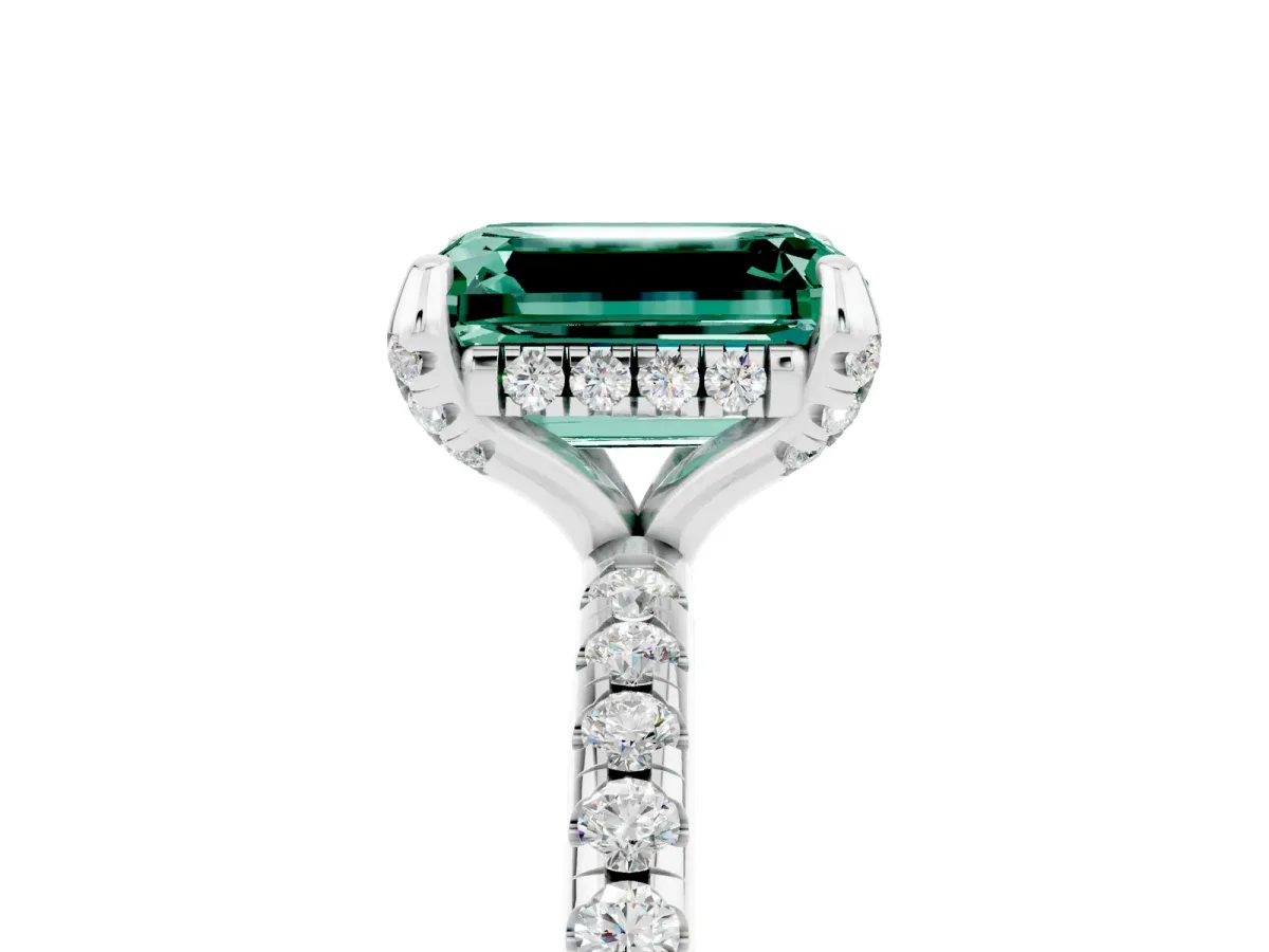 Emerald Cut Green Sapphire Hidden Halo Engagement Ring with Round Pavé Band and Prong Setting Silver
