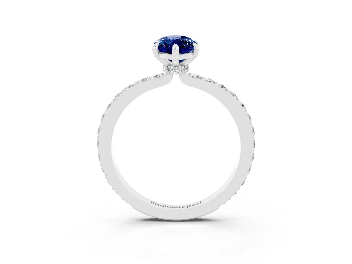 Marquise Cut Blue Sapphire Solitaire Engagement Ring with Pavé Band and Four-Prong Setting White gold