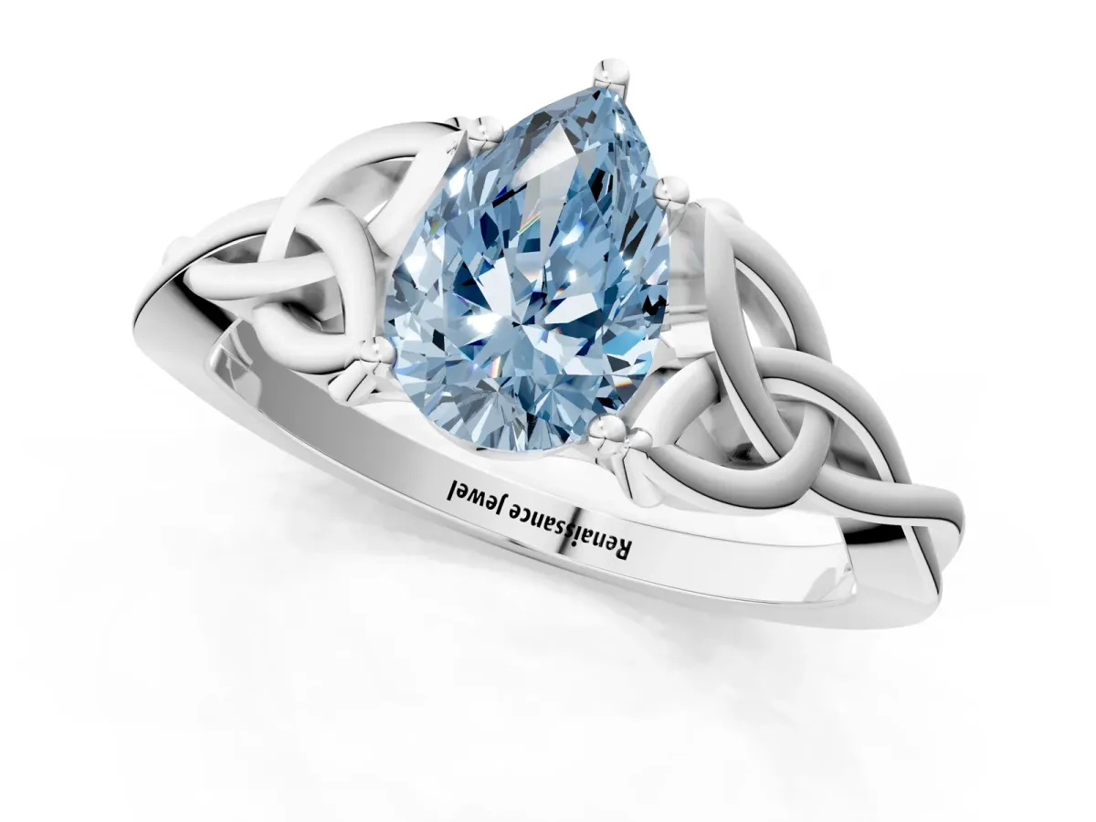 Fancy Blue Pear Cut Diamond Solitaire Celtic Knot Ring with Four-Prong Setting White gold