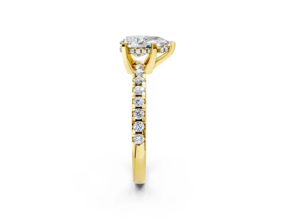 Pear Cut Diamond Solitaire Ring with Round Pavé Band and Four-Prong Setting Yellow gold