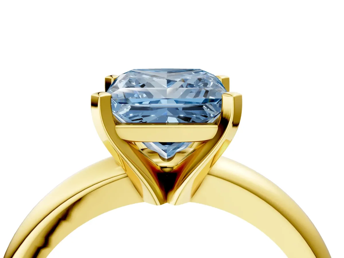 Fancy Blue Princess Cut Diamond Solitaire Engagement Ring with Round Band and Four-Prong Setting Yellow gold