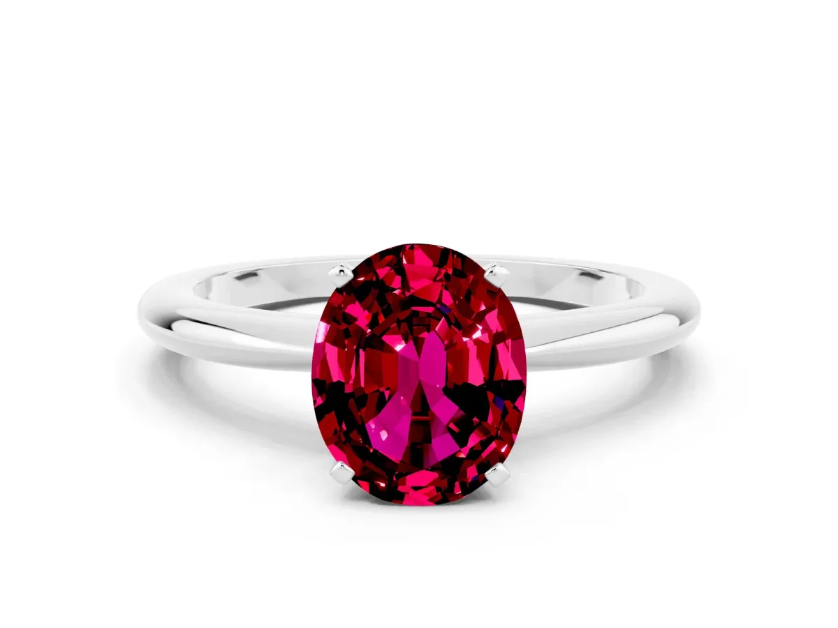 Oval Cut Garnet Solitaire Ring with Six-Prong Setting and Classic Band Platinum