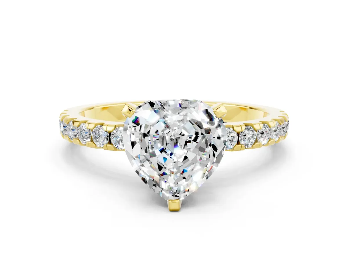 Heart Cut Moissanite Solitaire Ring with Round Pavé Band and Four-Prong Setting Yellow gold
