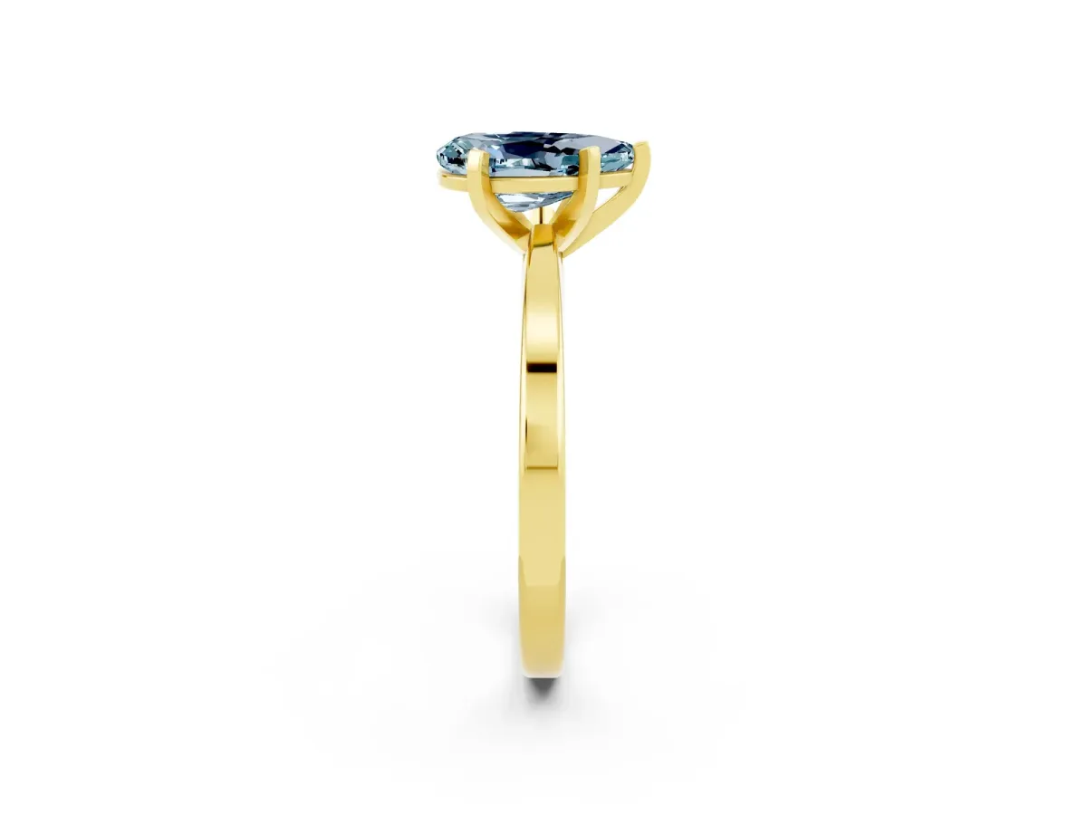 Pear Cut Aquamarine Solitaire Engagement Ring with Classic Band and Four-Prong Setting Yellow gold