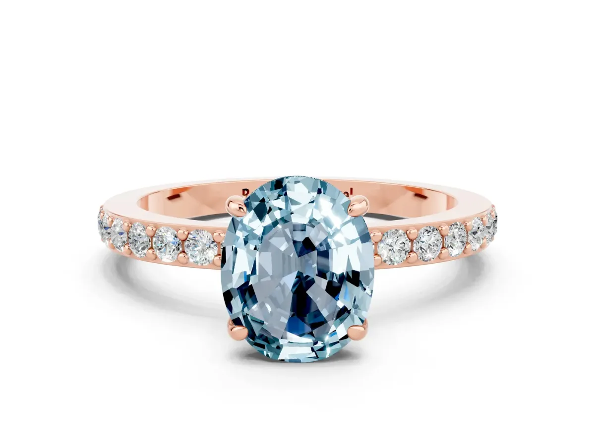 Oval Cut Aquamarine Solitaire Engagement Ring with Pavé Band and Four-Prong Setting Rose gold