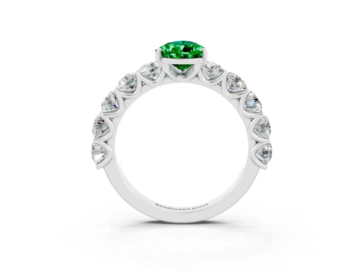 Pear Cut Emerald Prong Setting with Side Stones on a Pave Band Platinum