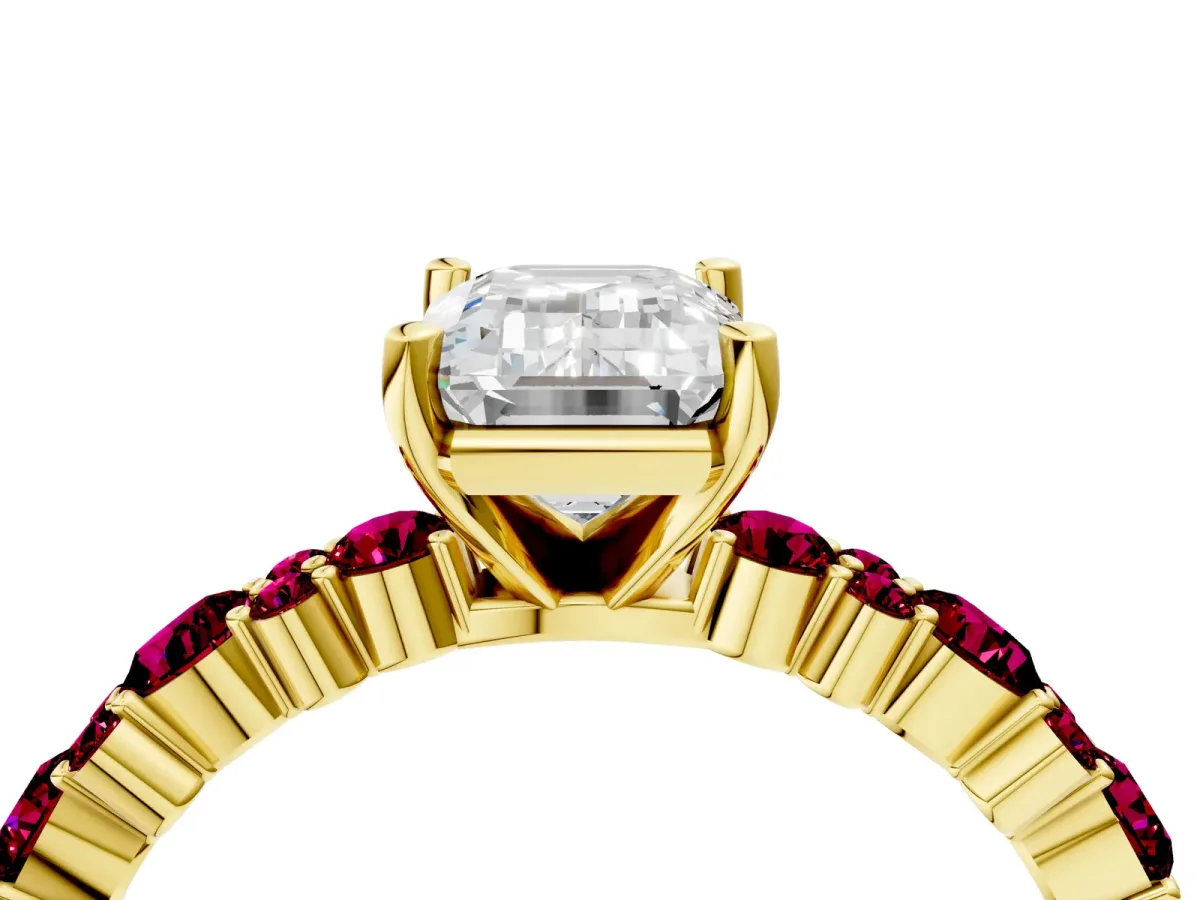 Emerald Cut Diamond Side Stone Solitaire Ring with Round Garnet and Four-Prong Setting Yellow gold