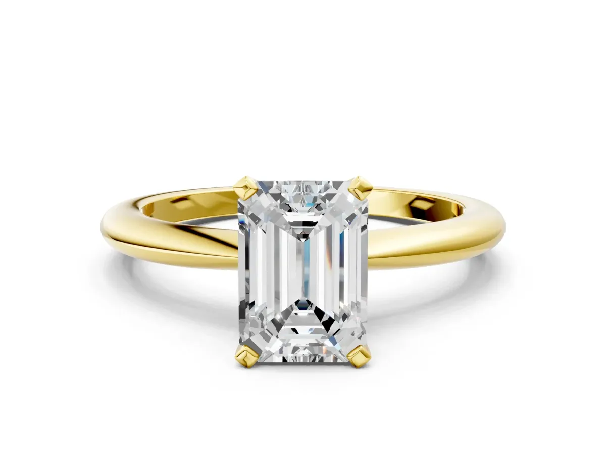 Emerald Cut Diamond Solitaire Ring with Six-Prong Setting and Classic Band Yellow gold