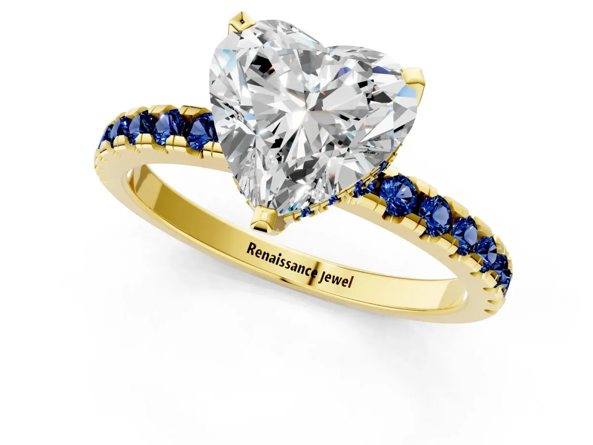 Heart Cut Diamond Solitaire Ring with Round Blue Sapphire Pavé Band and Four-Prong Setting Yellow gold