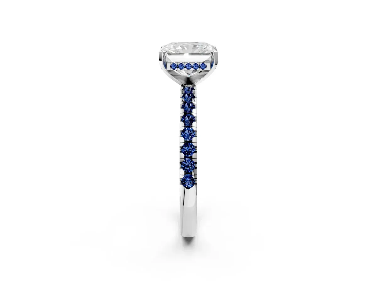 Radiant Cut Diamond Solitaire Ring with Round Blue Sapphire Pavé Band and Four-Prong Setting White gold