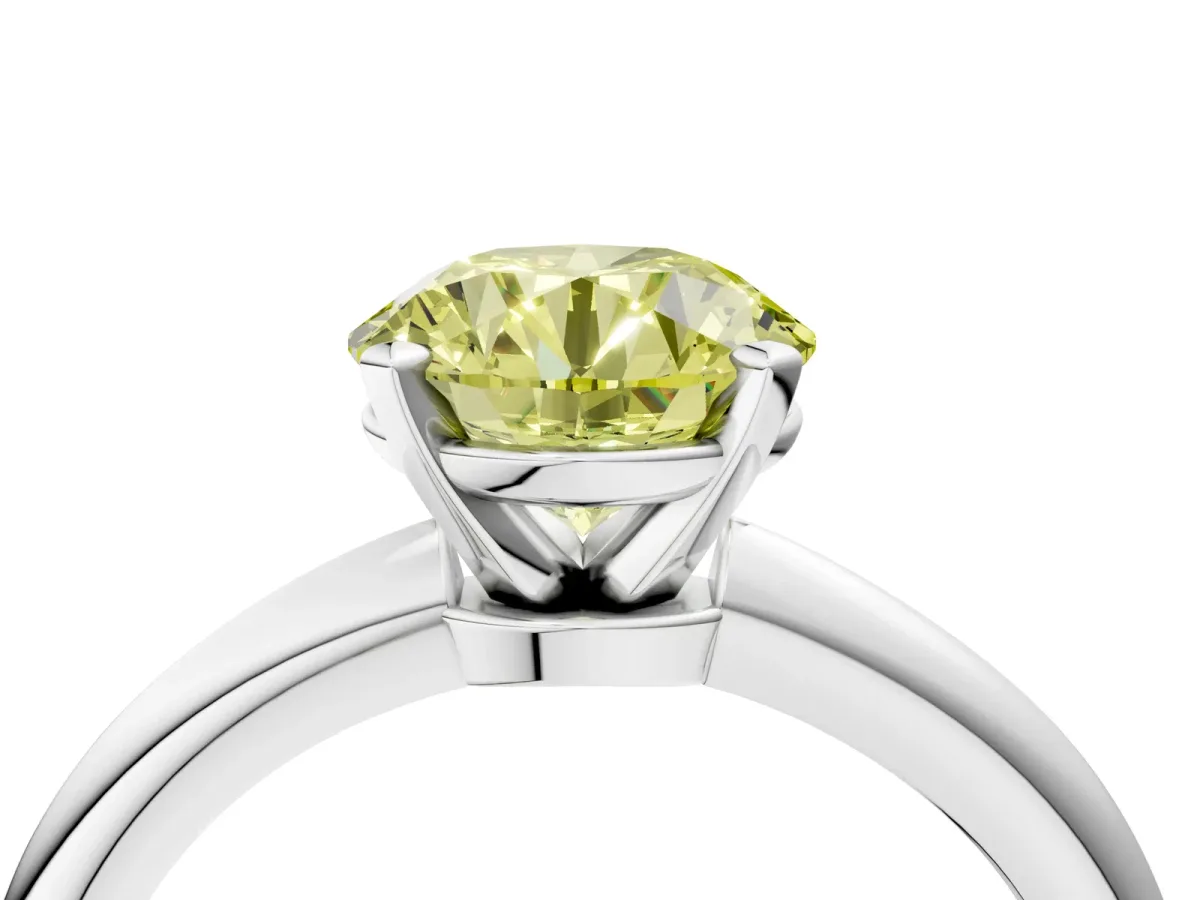 Fancy Yellow Round Cut Diamond Solitaire Ring with Six-Prong Setting and Classic Band Silver