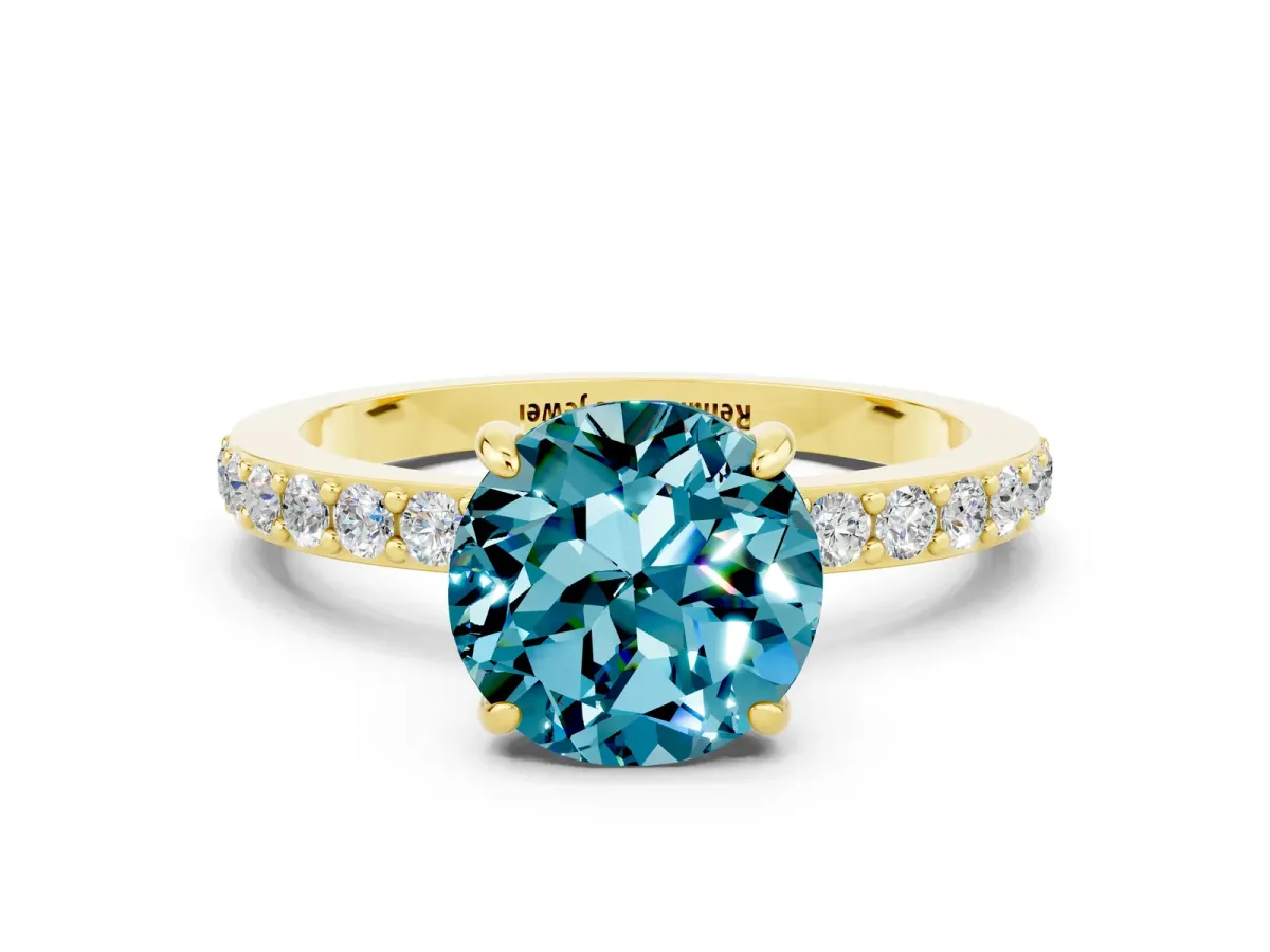Round Cut Blue Topaz Solitaire Engagement Ring with Pavé Band and Four-Prong Setting Yellow gold
