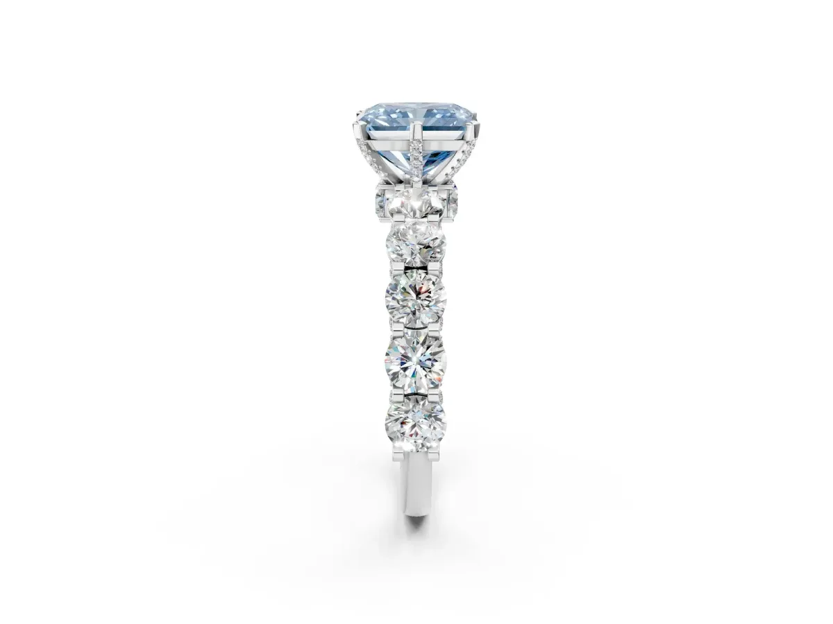 Fancy Blue Radiant Cut Diamond Side Stone Engagement Ring with Four-Prong Setting Silver