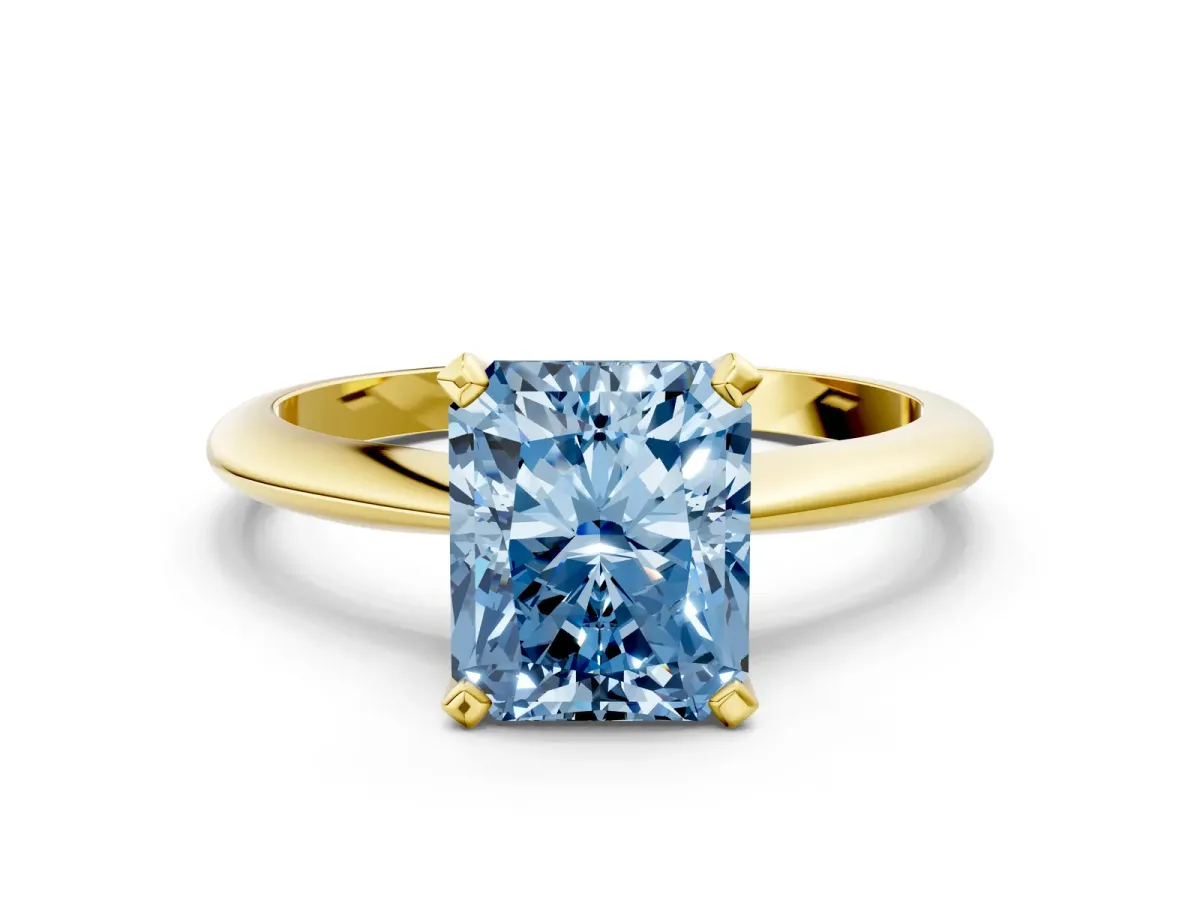 Fancy Blue Radiant Cut Diamond Solitaire Engagement Ring with Classic Band and Four-Prong Setting Yellow gold