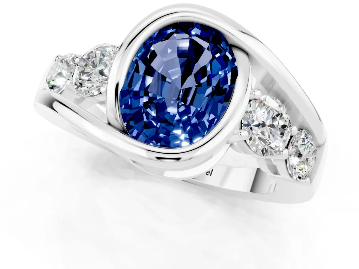 Bezel Set Oval Cut Blue Sapphire Bypass Ring with Round Accents Silver