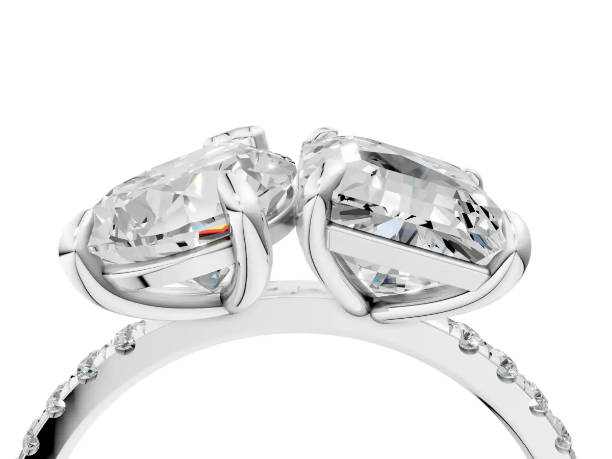 Pear and Emerald Toi Moi Ring with Prong Setting and Micro Pave Band Platinum