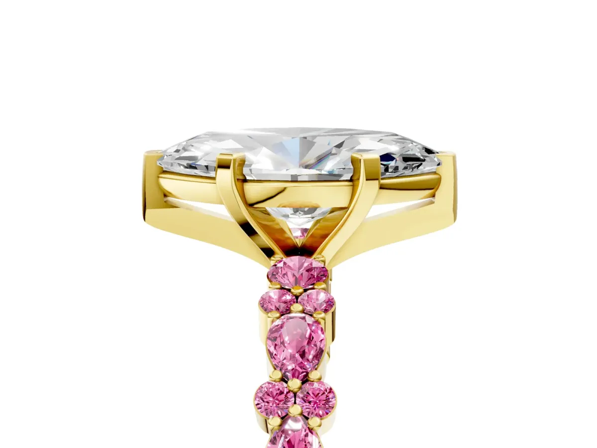 Marquise Cut Diamond Side Stone Solitaire Ring with Round Pink Sapphire and Four-Prong Setting Yellow gold