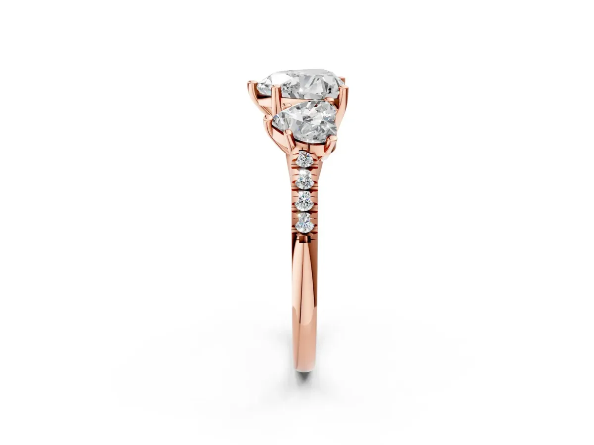 Three-Stone Heart Cut Diamond Ring with Round Moissanite Pavé Band and Prong Setting Rose gold