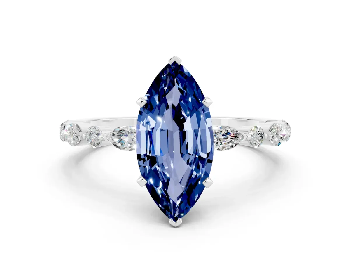 Marquise Cut Blue Sapphire Ring with Marquise and Round Side Stones and Four-Prong Setting White gold