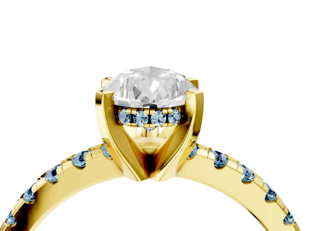 Pear Cut Diamond Solitaire Ring with Round Aquamarine Pavé Band and Four-Prong Setting Yellow gold