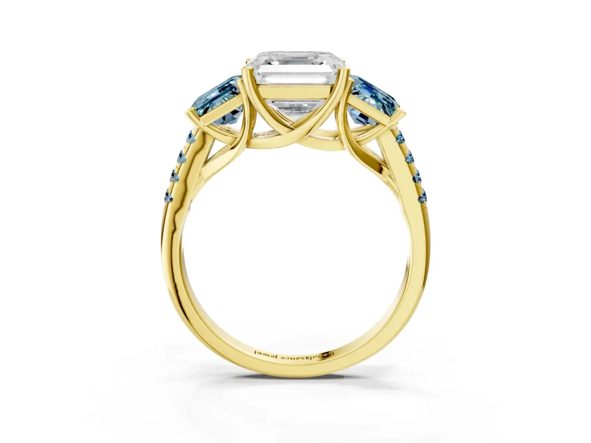 Three-Stone Asscher Cut Diamond Ring with Round Aquamarine Pavé Band and Prong Setting Yellow gold
