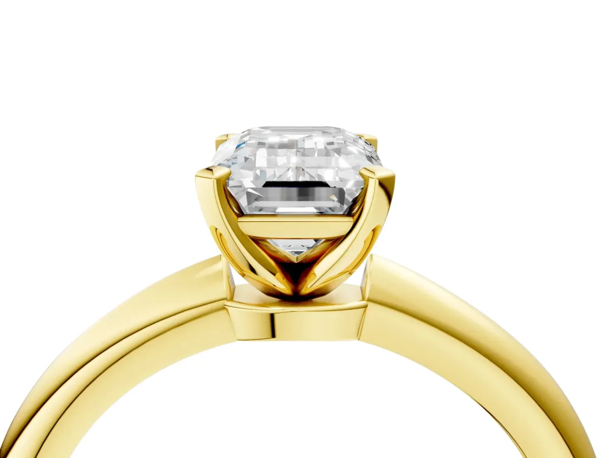 Emerald Cut Diamond Solitaire Ring with Six-Prong Setting and Classic Band Yellow gold