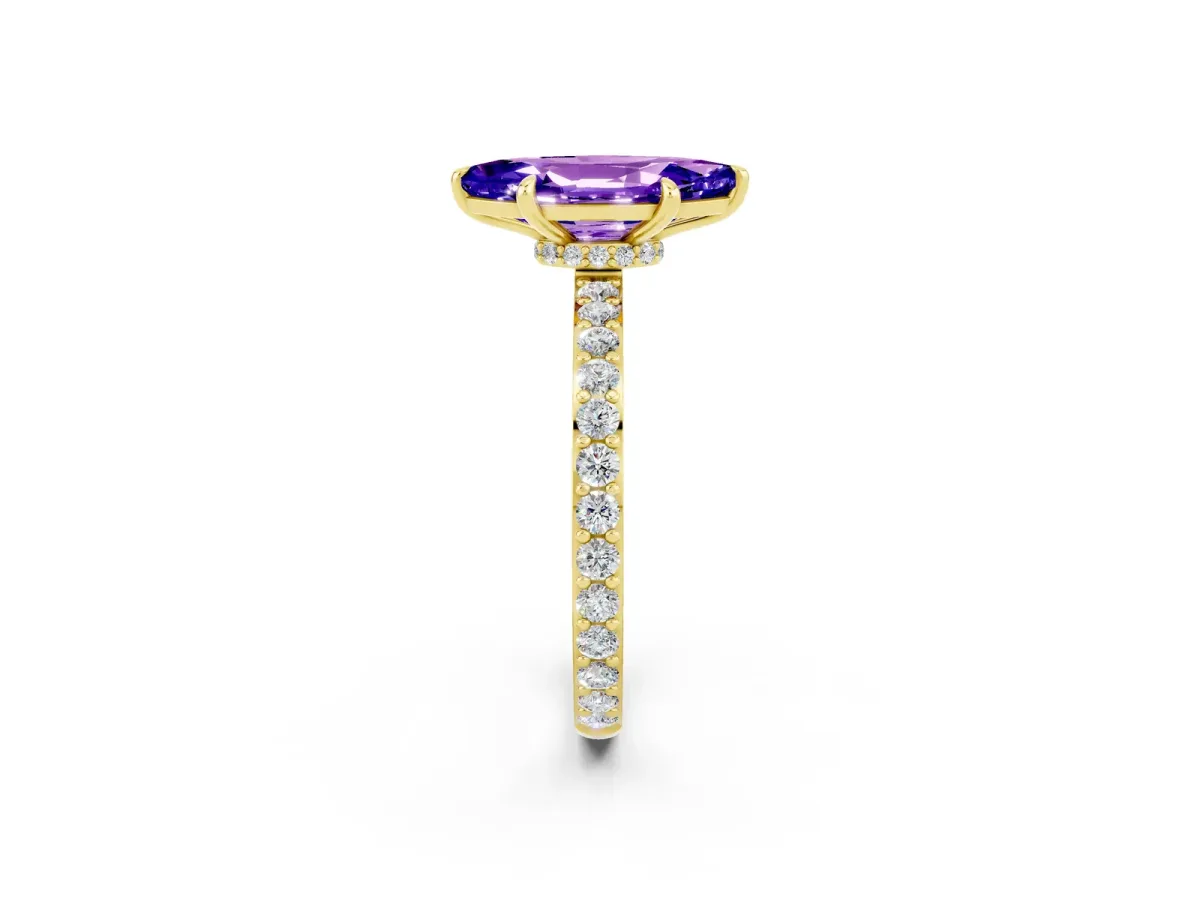 Marquise Cut Tanzanite Solitaire Engagement Ring with Pavé Band and Four-Prong Setting Yellow gold