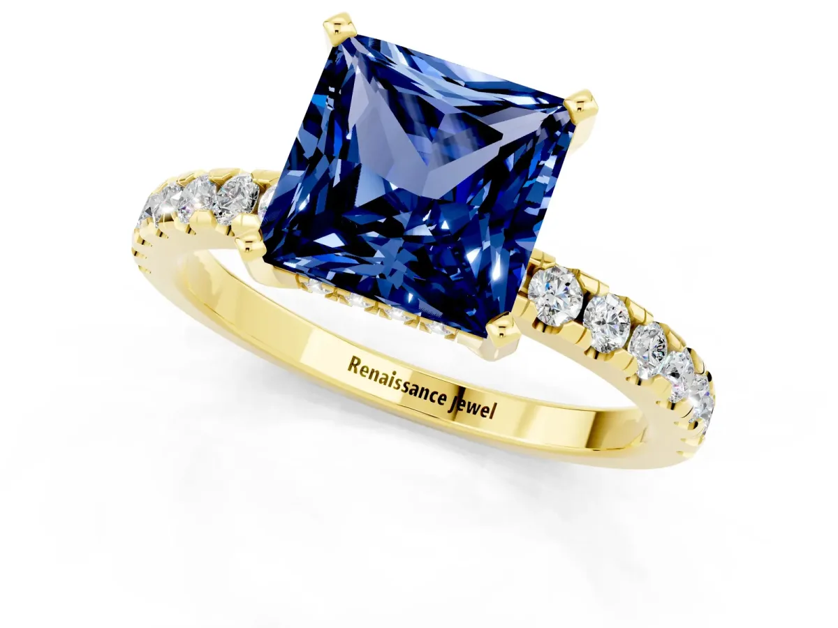 Princess Cut Blue Sapphire Solitaire Ring with Round Pavé Band and Four-Prong Setting Yellow gold