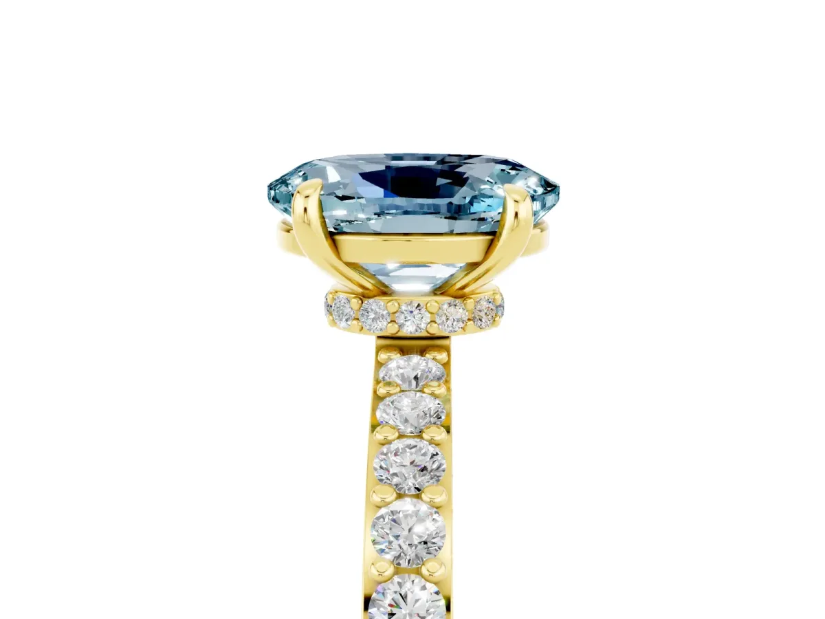 Oval Cut Aquamarine Solitaire Engagement Ring with Pavé Band and Four-Prong Setting Yellow gold