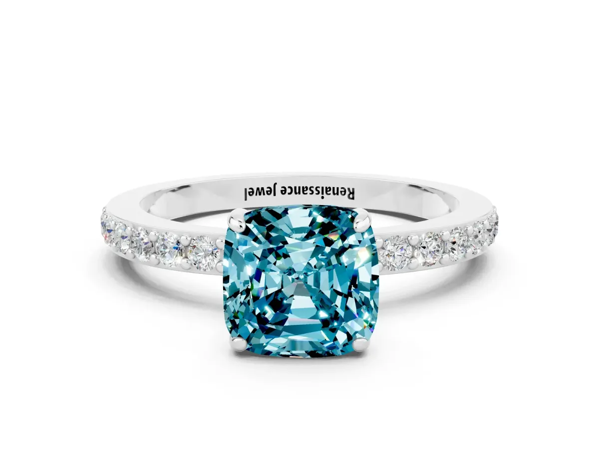 Cushion Cut Blue Topaz Solitaire Engagement Ring with Pavé Band and Four-Prong Setting White gold