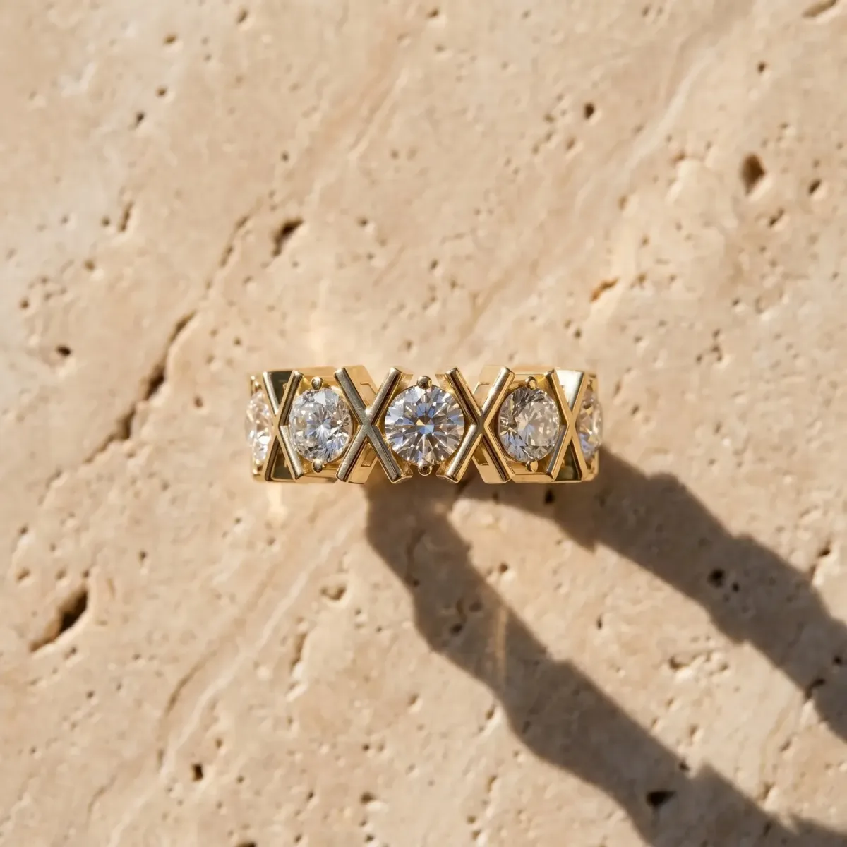 Round Diamond Channel Set Band with X-Prong Detail Yellow gold