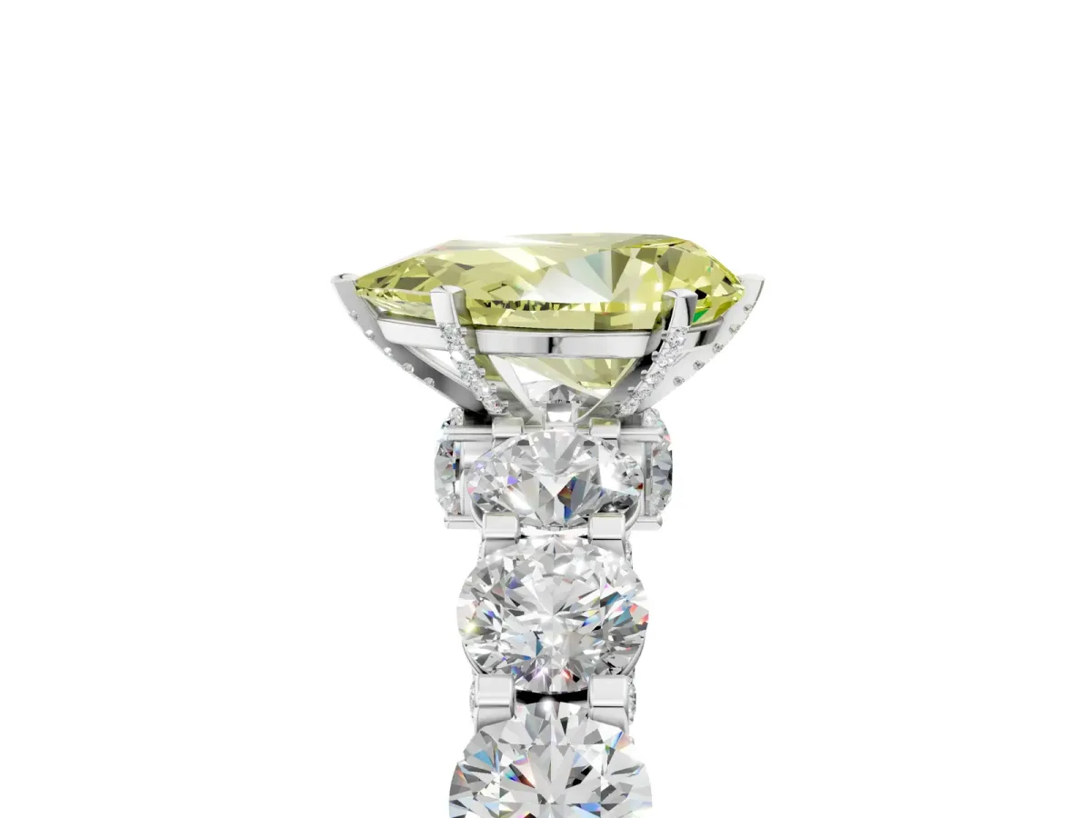 Fancy Yellow Pear Cut Diamond Side Stone Engagement Ring with Four-Prong Setting White gold