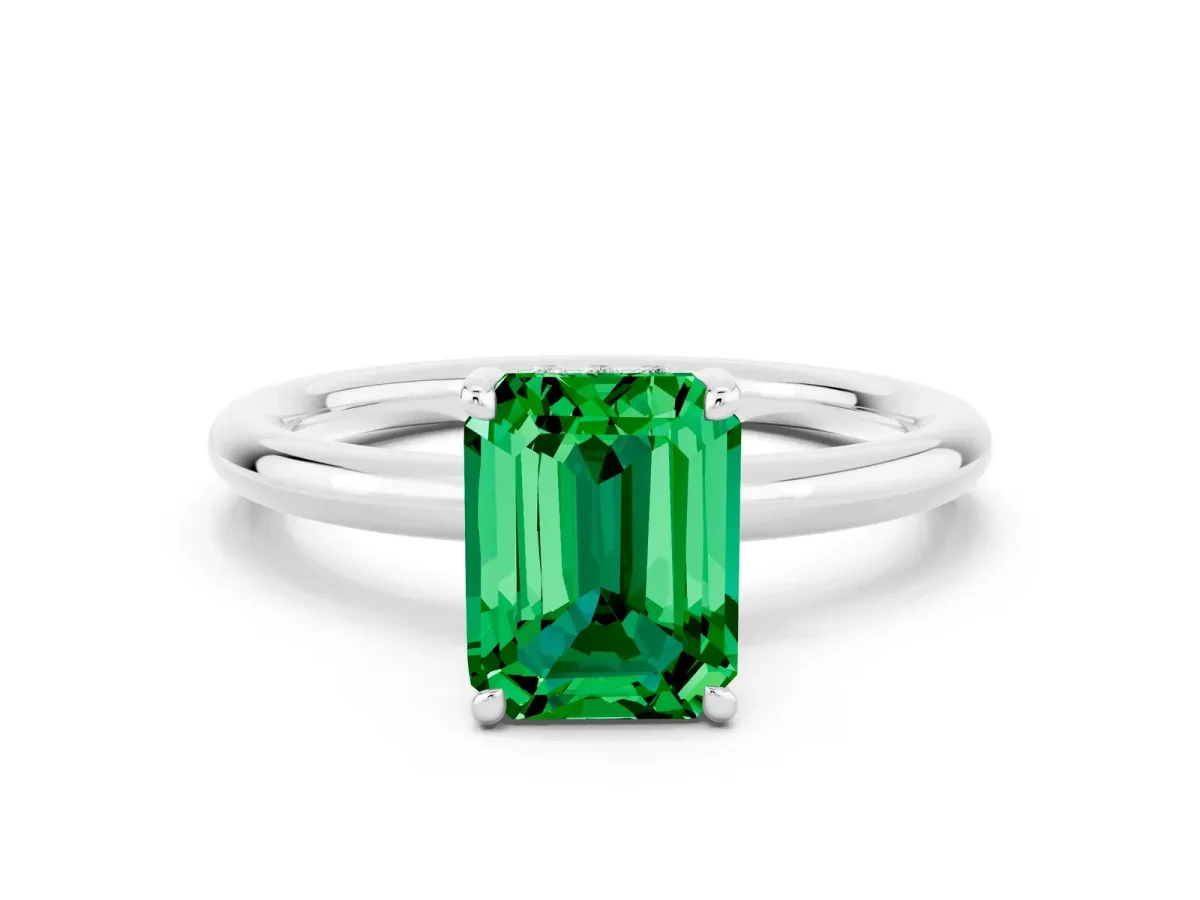 Emerald Cut Emerald Solitaire Ring with Thin Band and Four-Prong Setting White gold