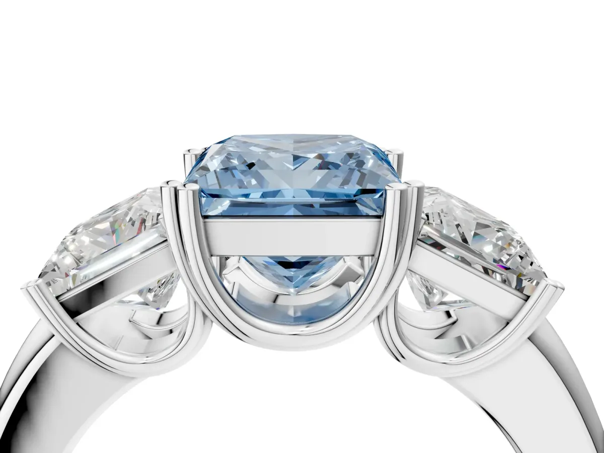 Fancy Blue Three-Stone Princess Cut Cut Diamond Ring with Channel Set Band and Four-Prong Setting Silver