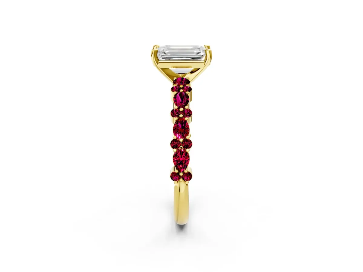 Emerald Cut Diamond Side Stone Solitaire Ring with Round Garnet and Four-Prong Setting Yellow gold