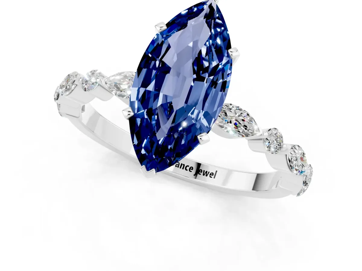 Marquise Cut Blue Sapphire Ring with Marquise and Round Side Stones and Four-Prong Setting White gold