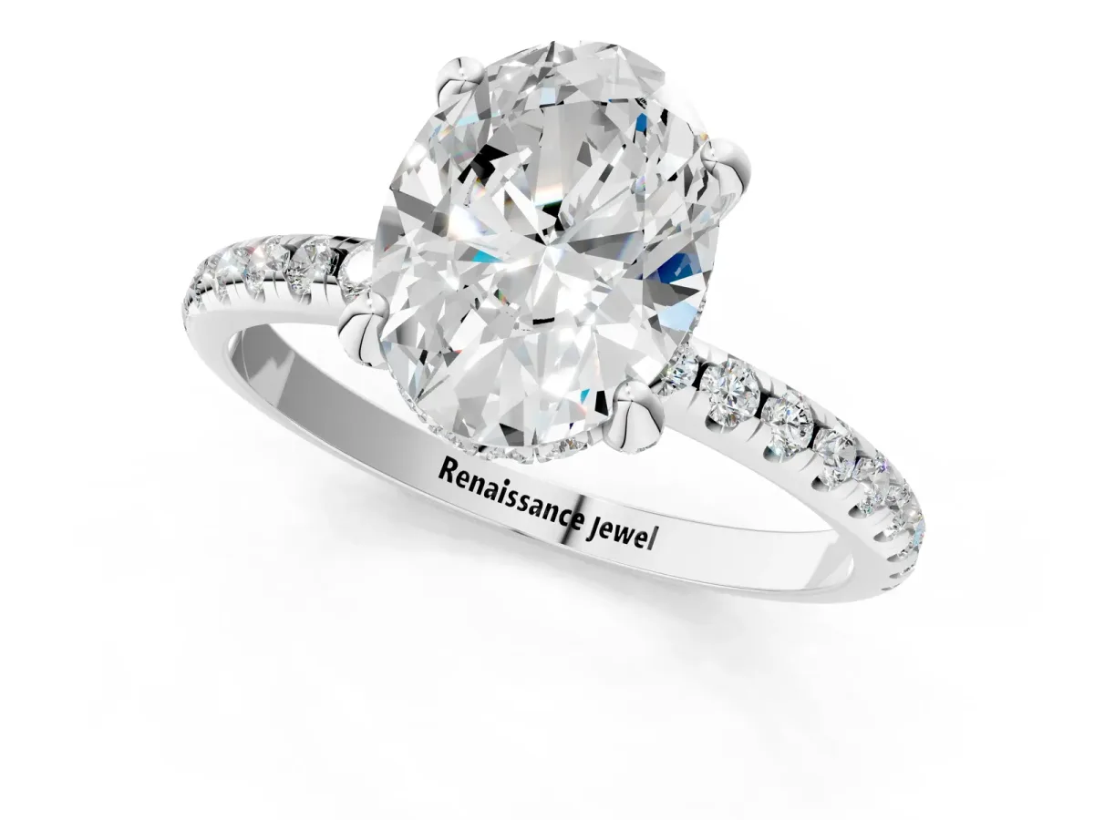 Oval Cut Diamond Hidden Halo Engagement Ring with Round Pavé Band and Prong Setting White gold