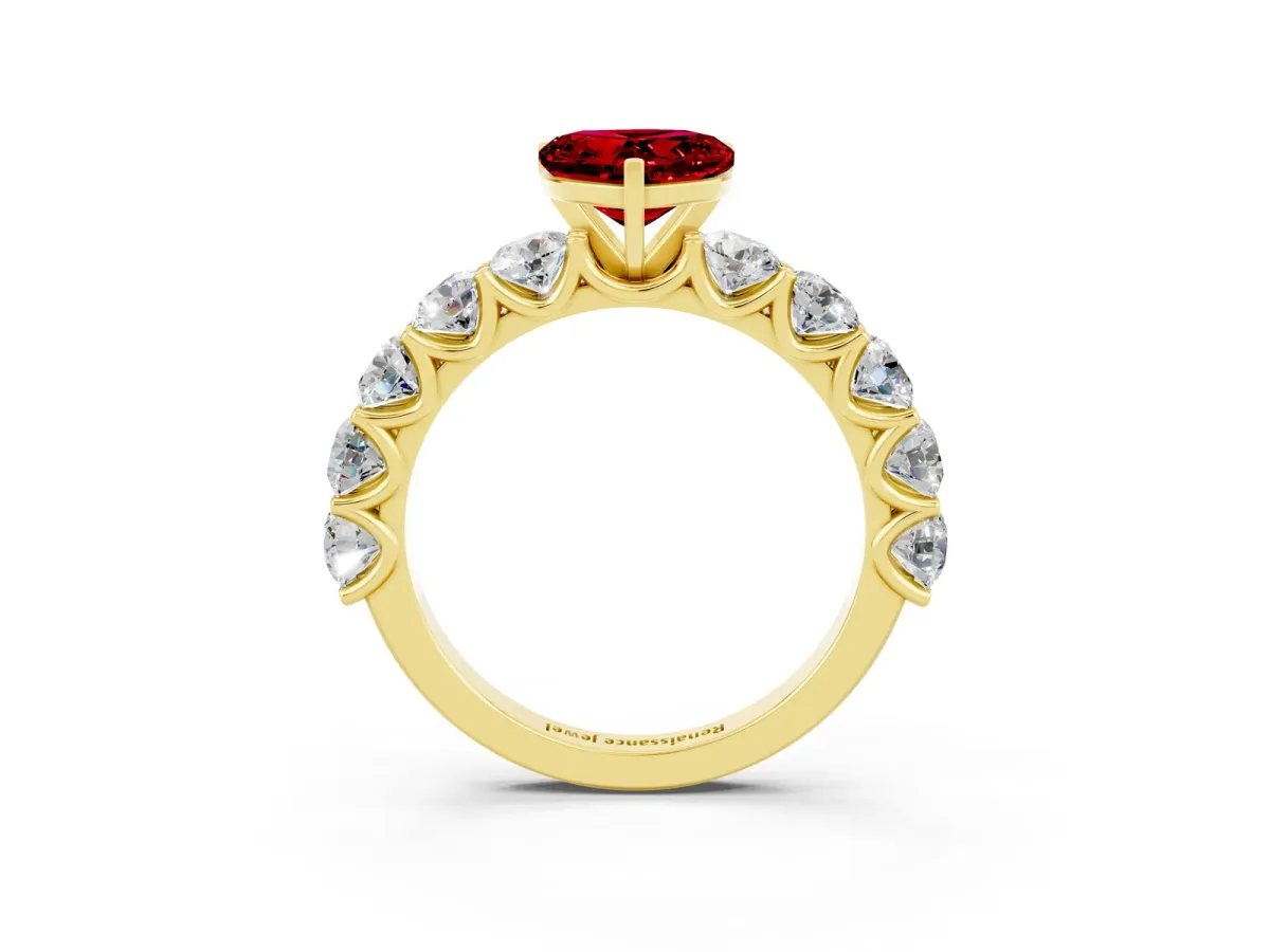 Heart Cut Ruby Prong Setting with Side Stones on a Pave Band Yellow gold