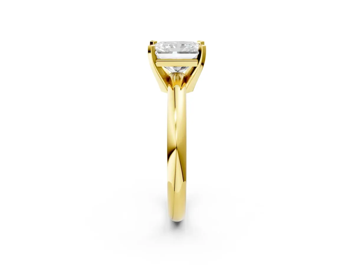 Radiant Cut Diamond Solitaire Engagement Ring with Round Band and Four-Prong Setting Yellow gold