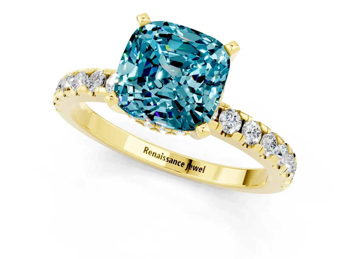 Cushion Cut Blue Topaz Solitaire Ring with Round Pavé Band and Four-Prong Setting Yellow gold